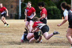 picture of rugby ground tackle during competitive game