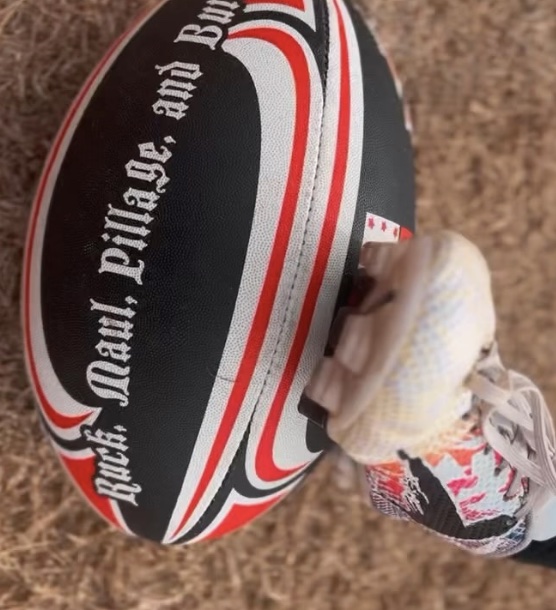 picture of UGAWRFC instagram post that shows cleat on georgia rugby ball